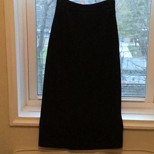 Women’s wool black long skirt zipper in the back and a kick plate on the bottom